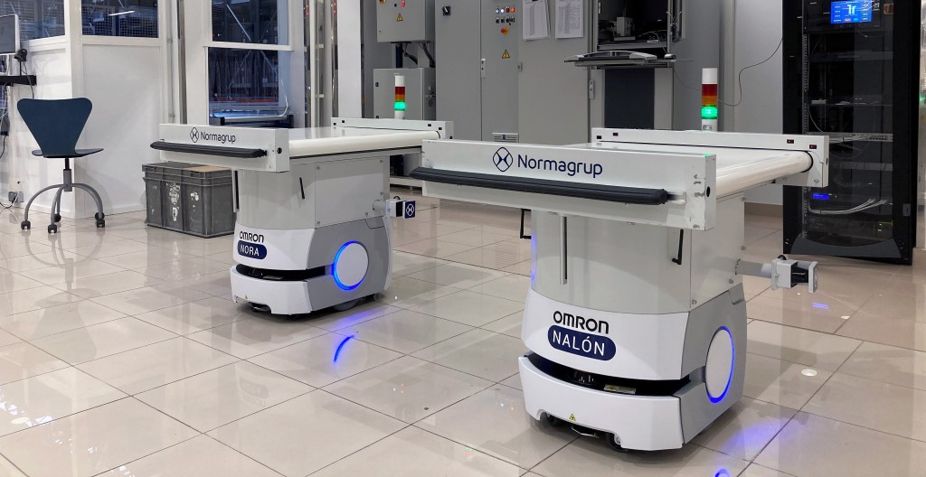Conveyor system integrated with mobile robots for efficient transport_card-cropped