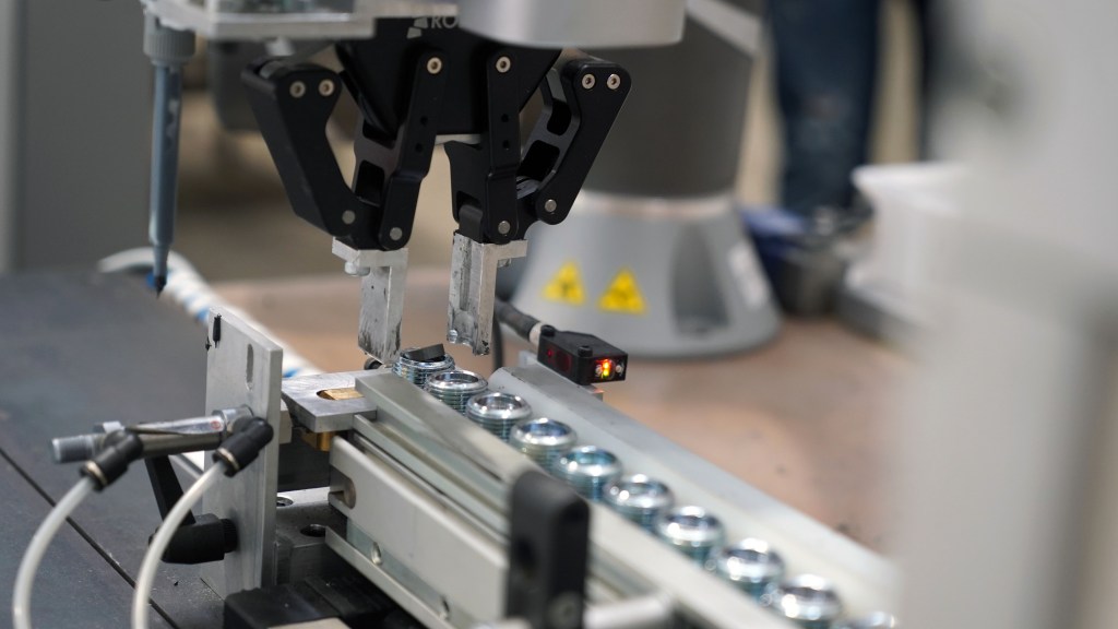 Automated assembly with collaborative robot for magnets