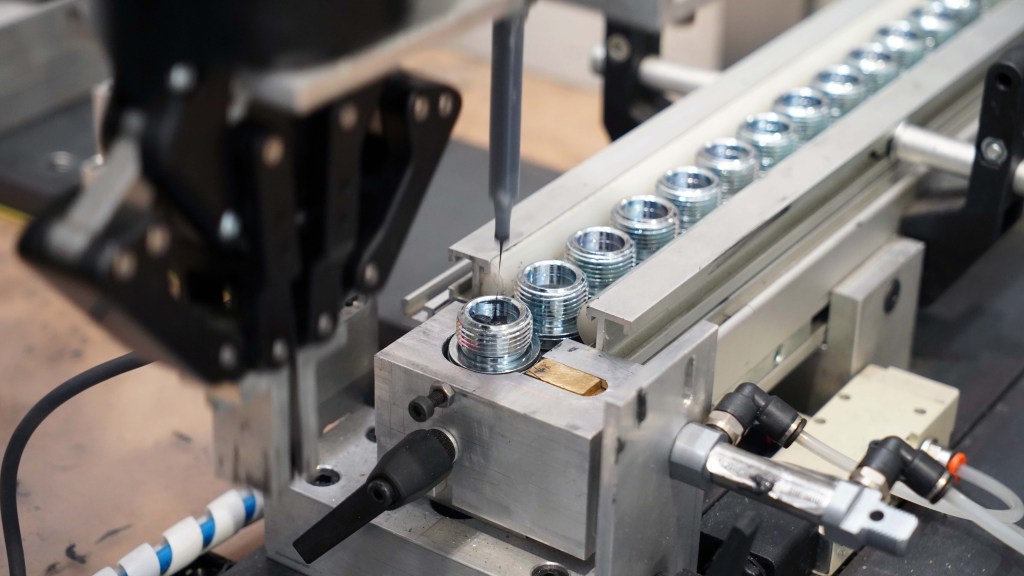 Cobot performing precise assembly operations