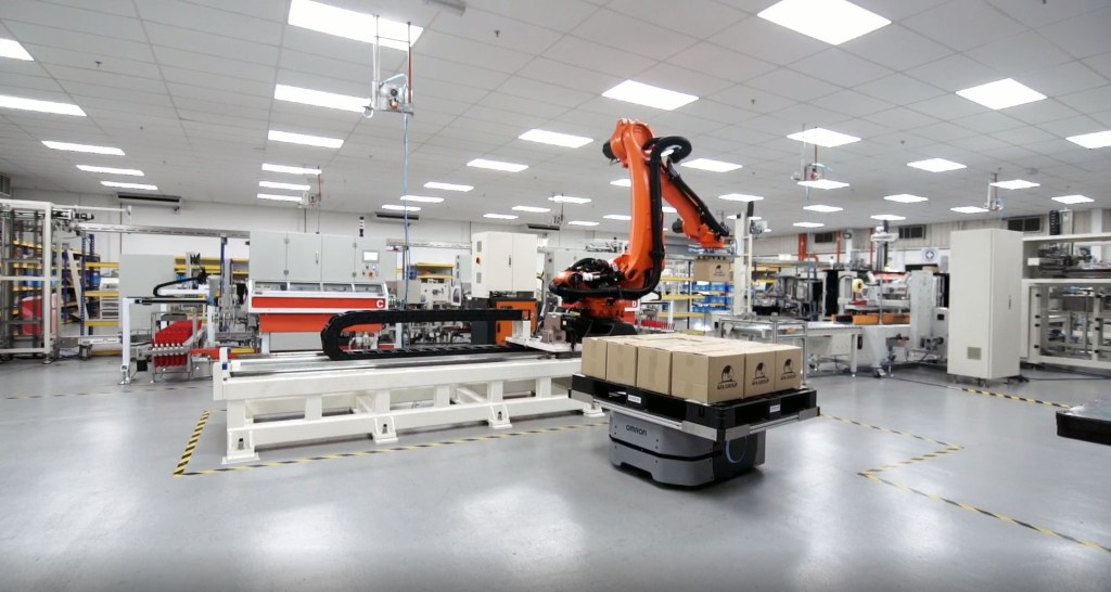 End-of-line glove packaging automation with minimal manual labor