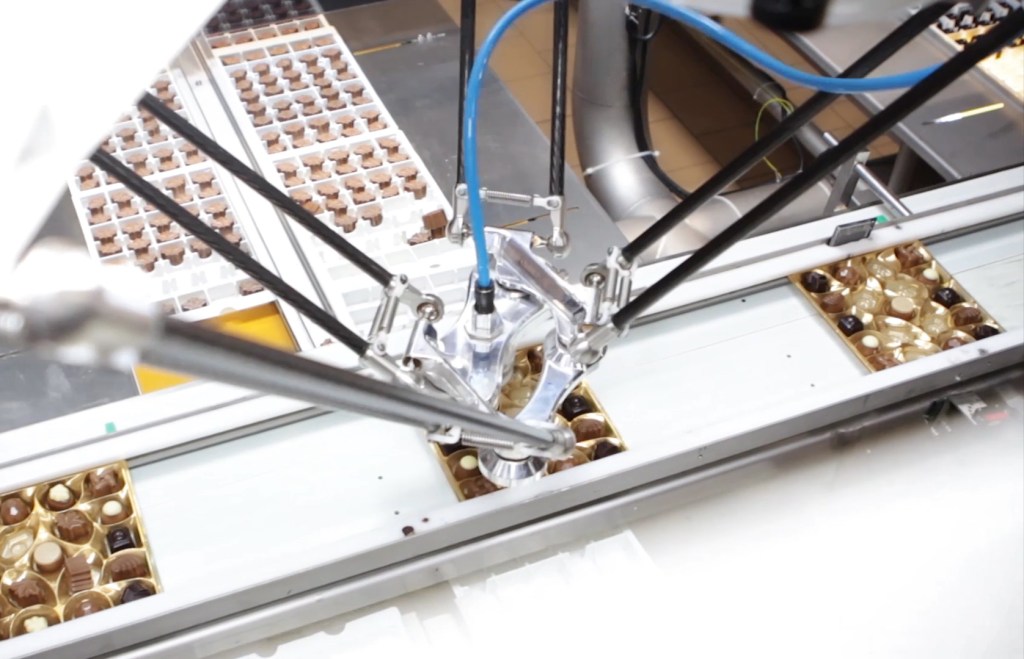 Quattro Parallel Robot for chocolate packaging automation