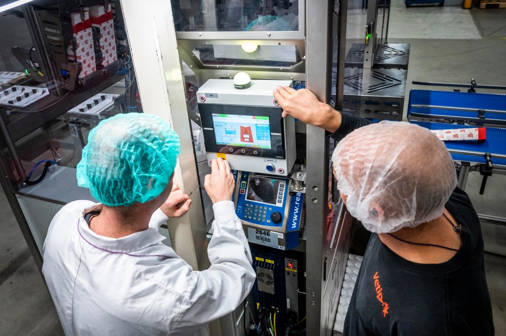 Close-up of FMCG packaging automation technology