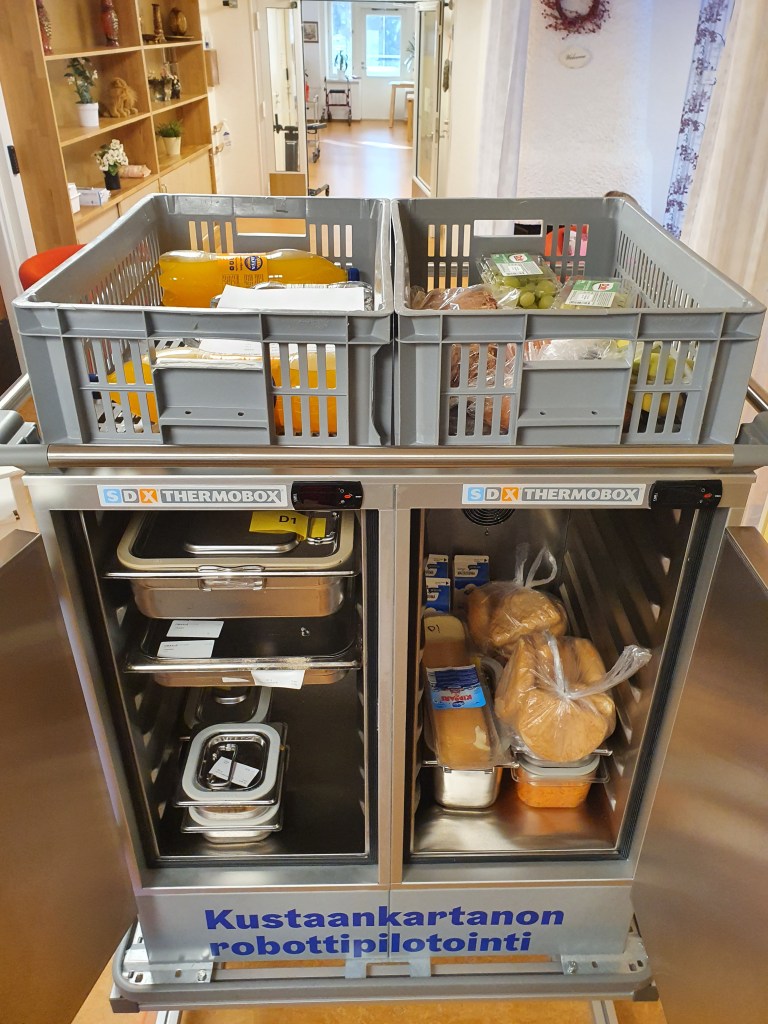 LD-250 service robot delivering meals at Kustaankartano Senior Center