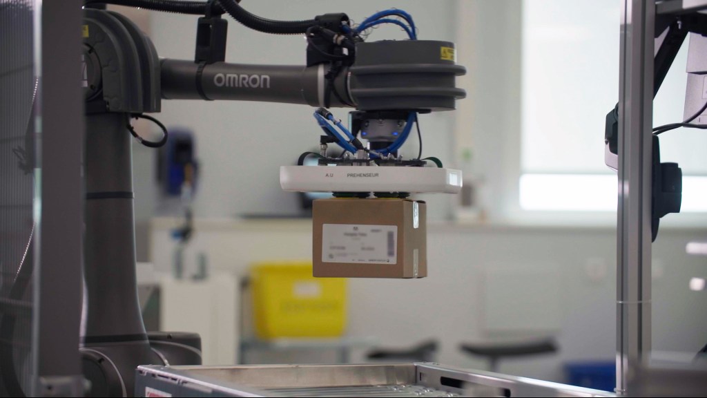 OMRON TM12 collaborative robot improving efficiency in vaccine packaging
