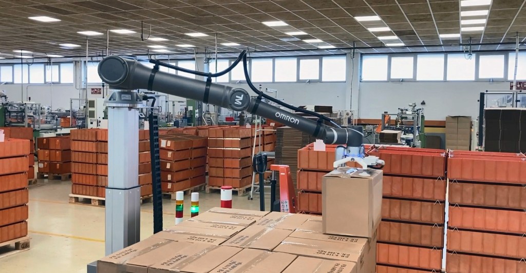 RC-1 robot arm stacking boxes on a pallet