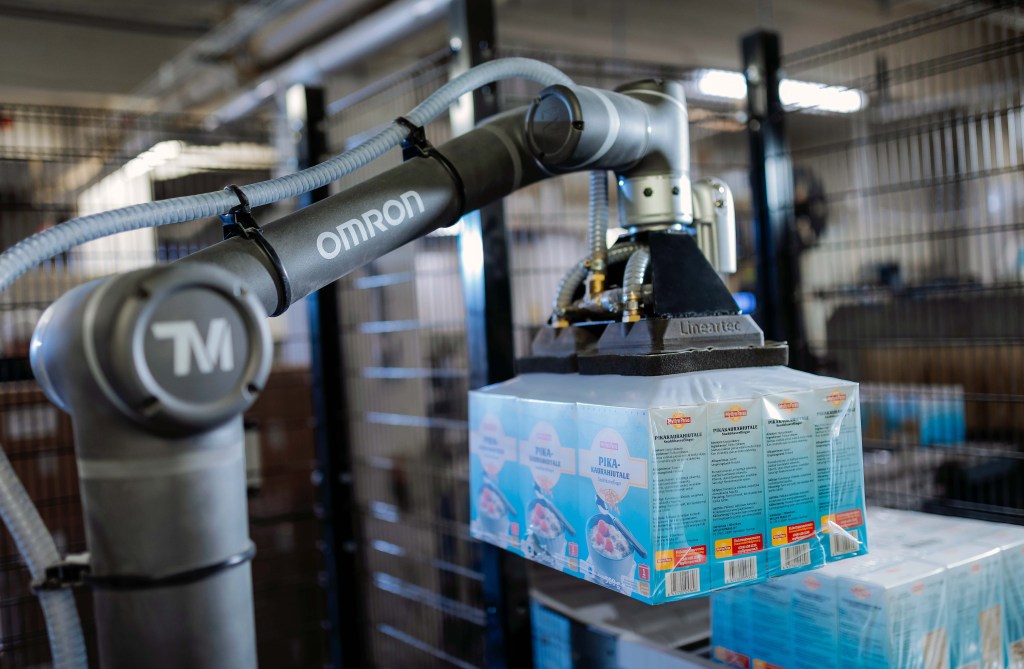 Robotic palletizing system stacking grain sacks at Myllyn Paras