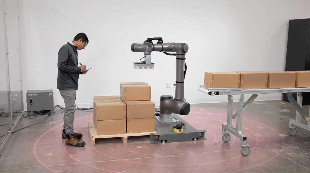 TM30S cobot stops automatically when person gets too close.