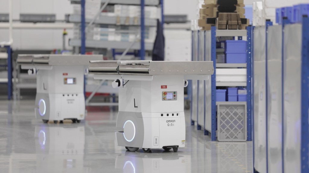 Two OMRON LD-60 Autonomous Mobile Robots Transporting Materials at VOLA's Production Facility